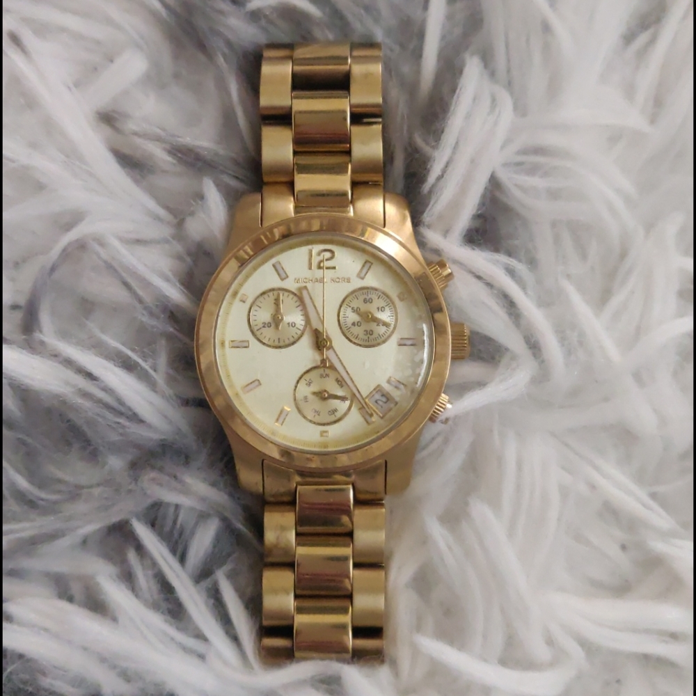 Micheal Kors gold watch